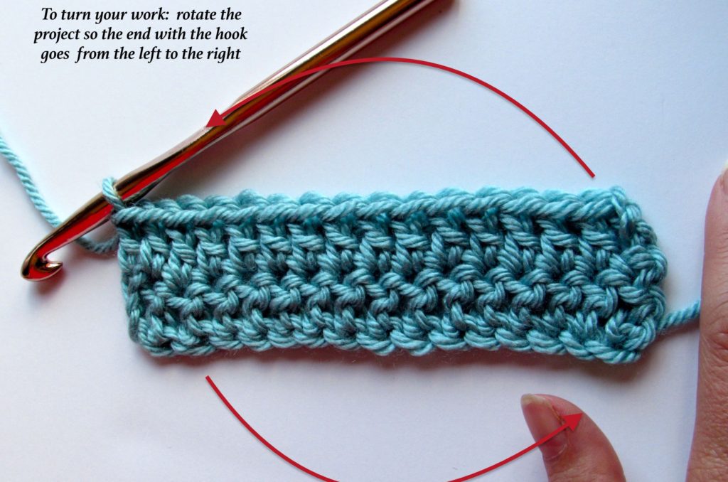 Turning your crochet work at the end of a row to begin the next row.