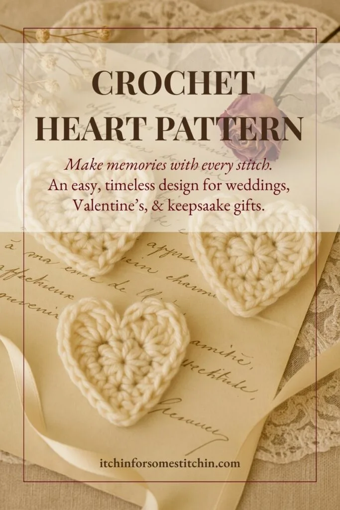 Lifestyle photo featuring soft cream crochet hearts displayed on a cozy beige fabric surface. Perfect for gift toppers, keepsakes, or Valentine's crafts using a free beginner crochet heart pattern.