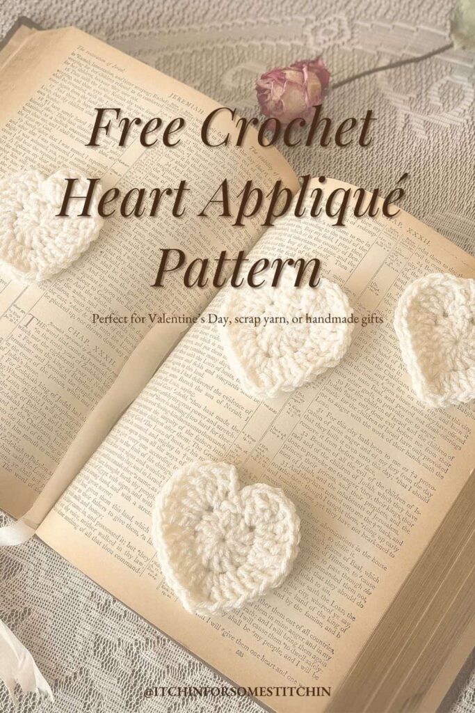 Vertical Pinterest pin image for a free crochet heart appliqué pattern. Vintage-style cream hearts displayed on an open Bible with lace in the background. Text overlay reads: ‘Free Crochet Heart Appliqué Pattern.