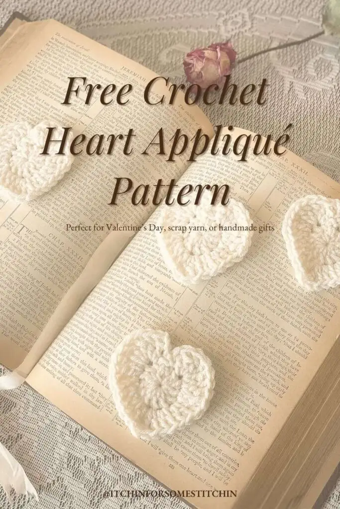 Vertical Pinterest pin image for a free crochet heart appliqué pattern. Vintage-style cream hearts displayed on an open Bible with lace in the background. Text overlay reads: ‘Free Crochet Heart Appliqué Pattern.