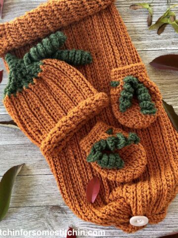 crochet pumpkin baby hat, mittens, and sleep sack by www.itchinforsomestitchin.com
