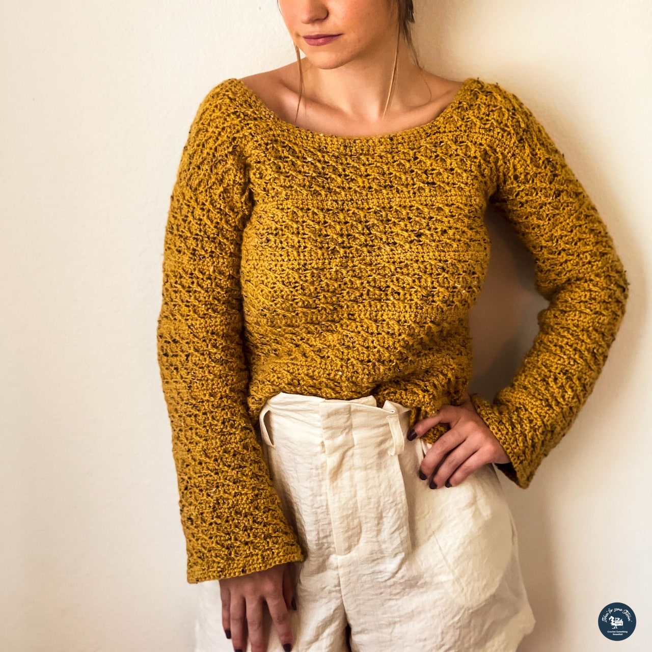 Emelita Twist Bell Sleeve Sweater