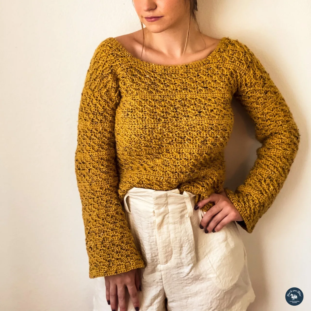 Emelita Twist Bell Sleeve Sweater
