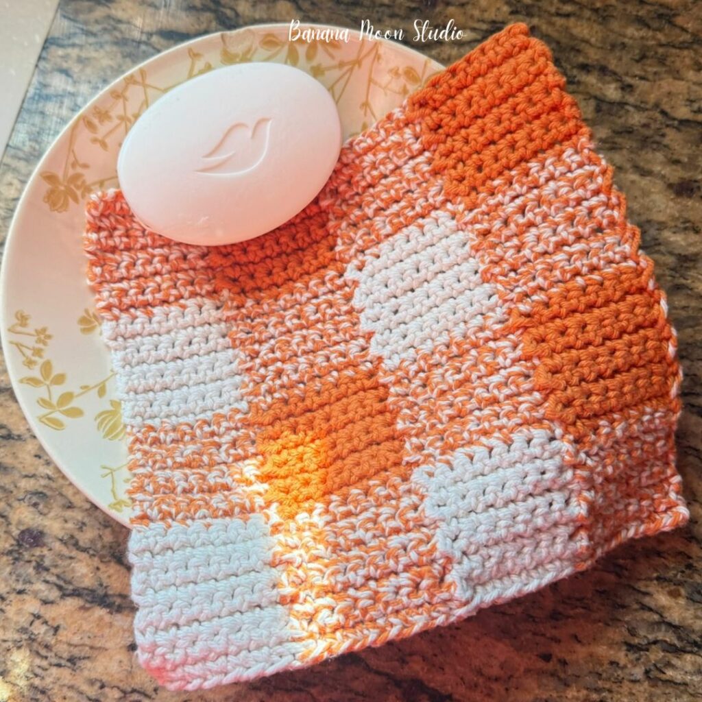 Orange and cream crochet gingham dishcloth by Banana Moon Studio